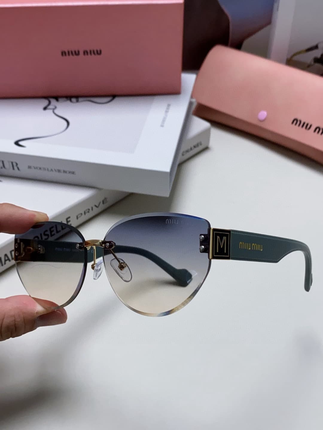 Miumiu Sunglasses