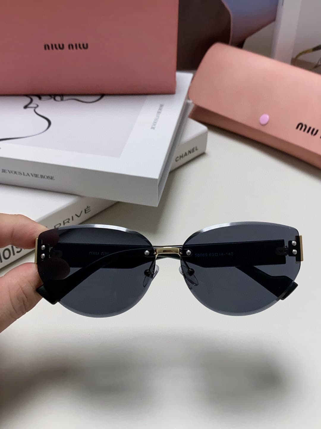 Miumiu Sunglasses